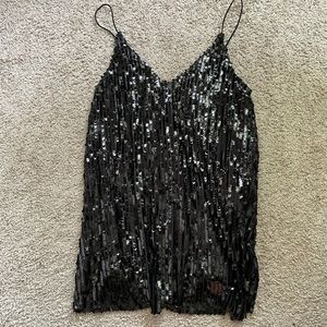 Black sequin little black dress